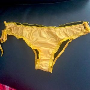 Bottom bikini gold color swim piece. Size small. fashionable design